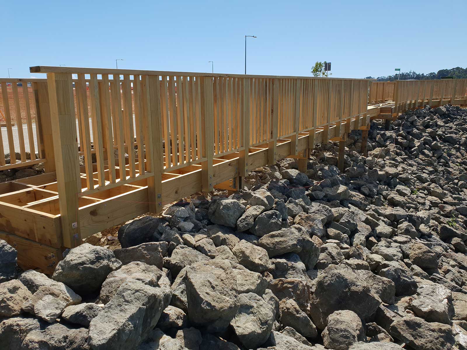 stormwater-pond-construction-footbridge